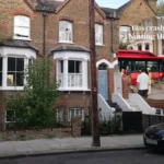 Single-Decker Bus Hits House in North Kensington