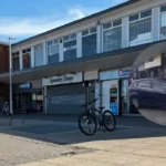 Vauxhall Corsa Hits Parked Ford, Crashes Into Bootle Optician
