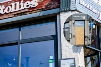 Woman Arrested After Car Hits Stollies Café