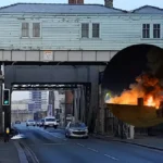 Liverpool scrap yard fire smoke plume over Kirkdale on Regent Road