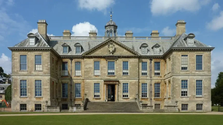 What is the history and origin of Woolton Hall in Liverpool